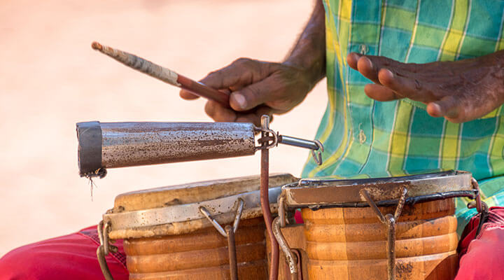 Man playing bongo drums